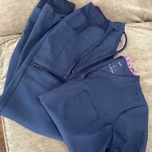Heart soul navy colored jogger scrubs.